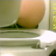 A hidden camera installed behind a toilet tank records a woman sitting on the toilet, peeing and taking a shit. Audio is excellent, but video is a bit grainy.